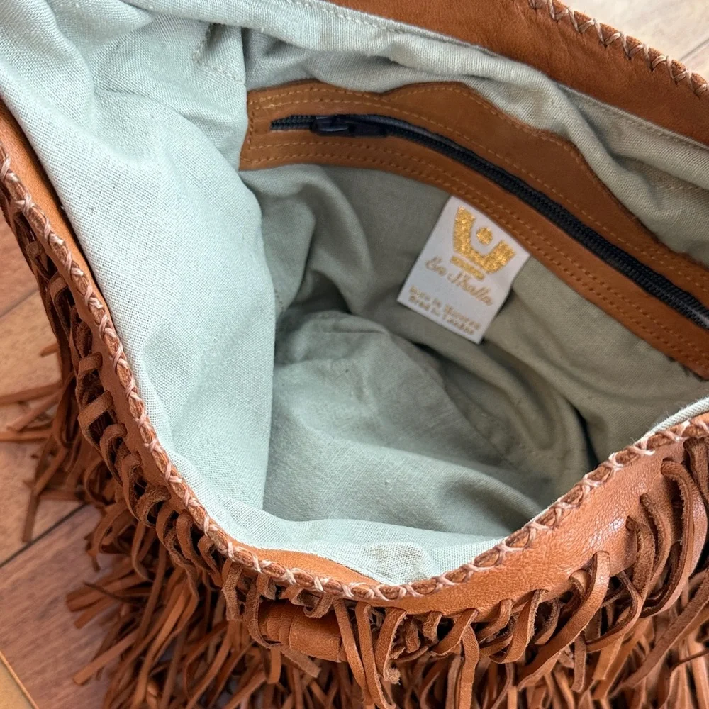 Boho Fringe Shoulder Bag - Tan

Perfect condition!! Like new!!! - Picture 9 of 11